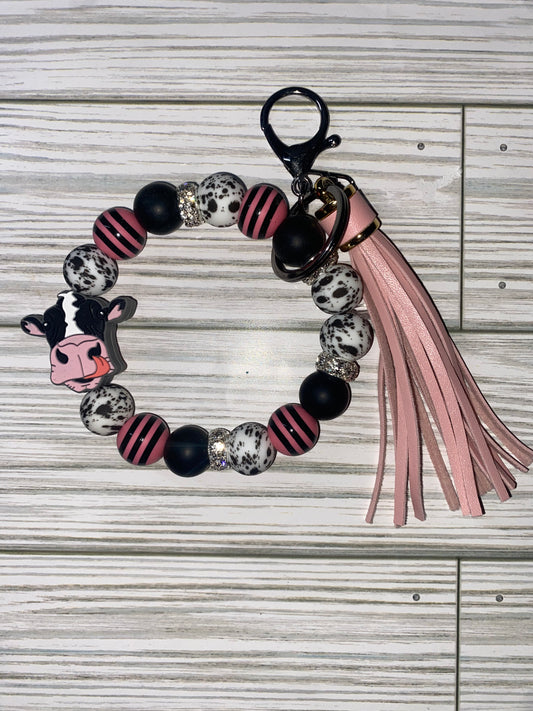 Black & pink cow stretchy wristlet keychain