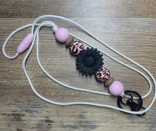 Black daisy and pink leopard lanyard with breakaway clasps